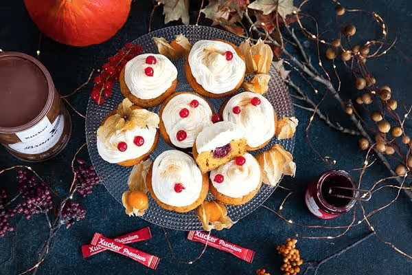 Pumpkin cupcakes with cream cheese frosting