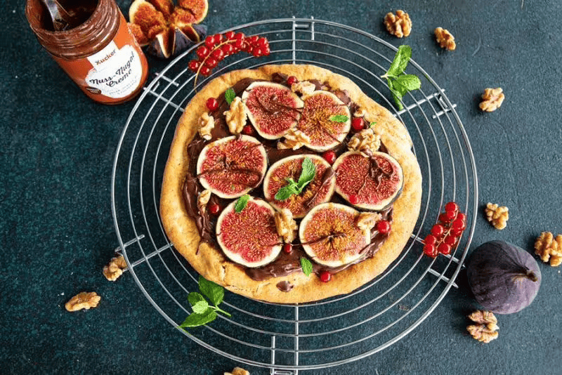 Sweet pizza with chocolate and figs