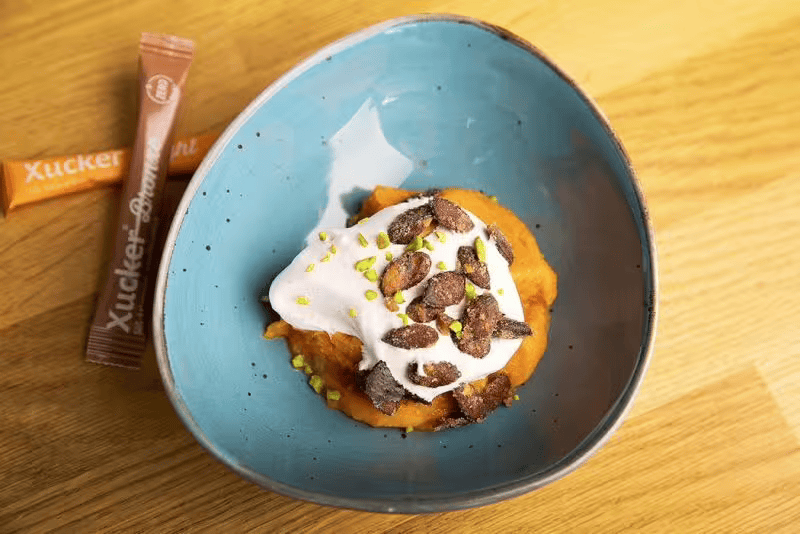 Vegan pumpkin ice cream with cinnamon foam